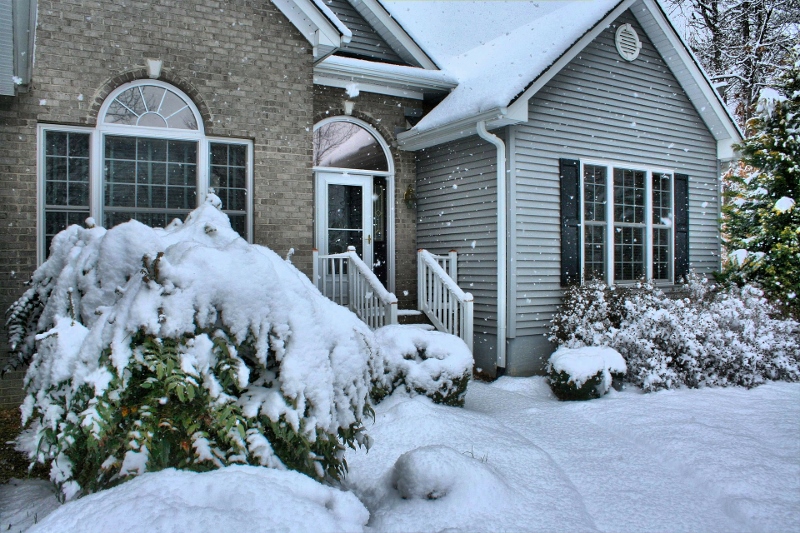 Snow-covered house in winter, radon testing in winter, Radon-Rid, LLC